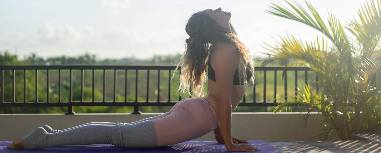 young woman practicing yoga